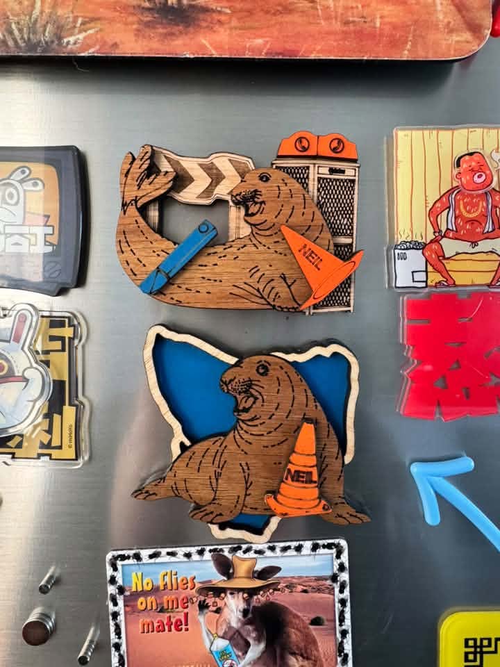 Neil The Seal magnets on fridge